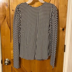 H & M, women’s white and navy blue, long sleeve blouse.